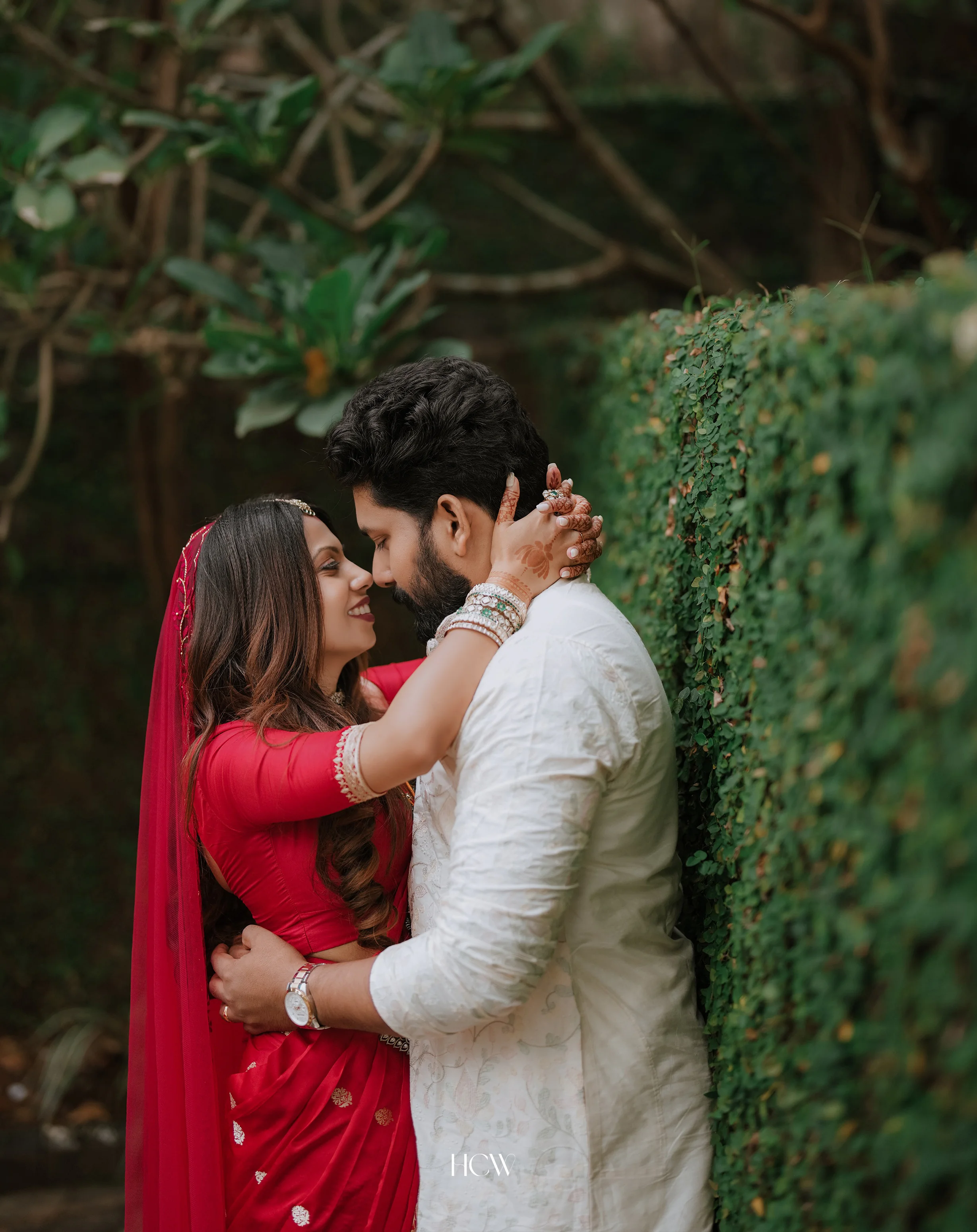 Couple embracing in a quiet garden moment